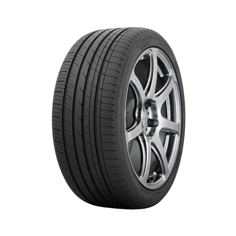 Toyo Proxes Comfort MC1 tyre — three-quarter studio view of the tread and alloy wheel